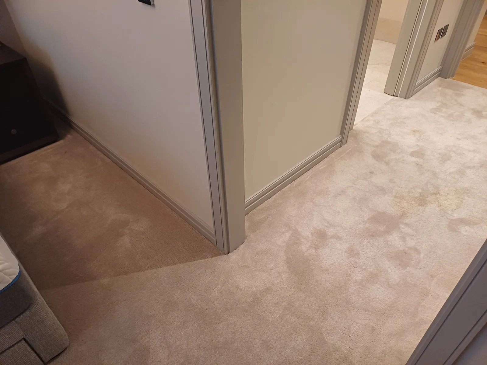 Carpet corner on a landing being cleaned