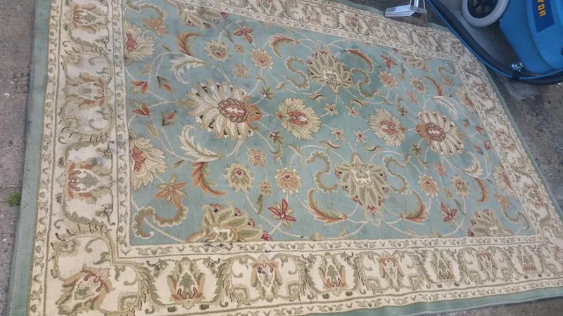 Same area rug after cleaning, fully restored